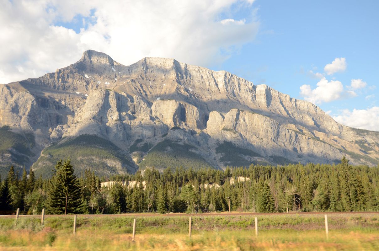 22 The Ridge From Mount Rundle 1 Descends To Banff From Trans Canada Highway Between Canmore and Banff In Summer Early Morning